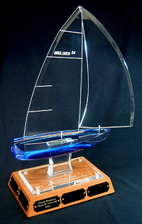 Small acrylic sailing trophy with spinnaker, 10 plates